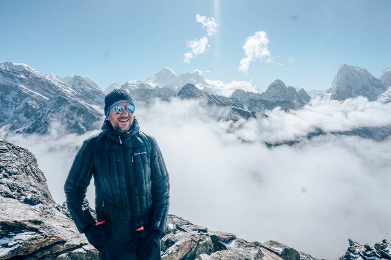 Trevor Hahn with a mountain range behind him.