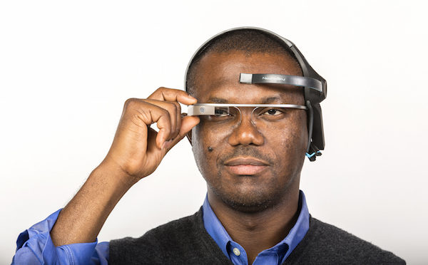 Zuby Onwuta wears an accessible headset technology.