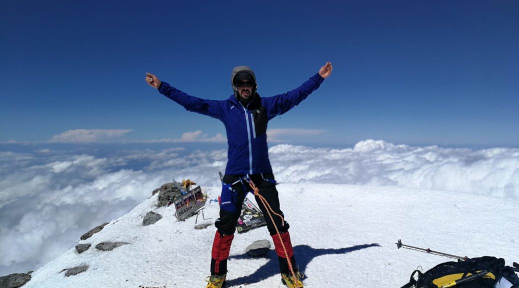 Javier García Pajares standing on an icy mountaintop.